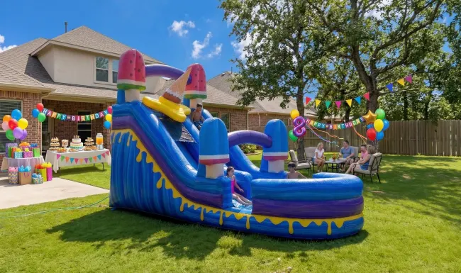Inflatable bounce house and water slide party rentals with delivery overview